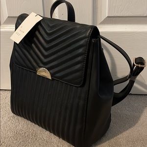 Black pocket book back pack